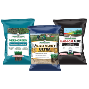 Three bags of Jonathan Green lawn care products: Veri-Green, Black Beauty Ultra, and Mag-I-Cal Plus Grass Seed & Fertilizer Bundle for Acidic Soil, displayed against a transparent background.